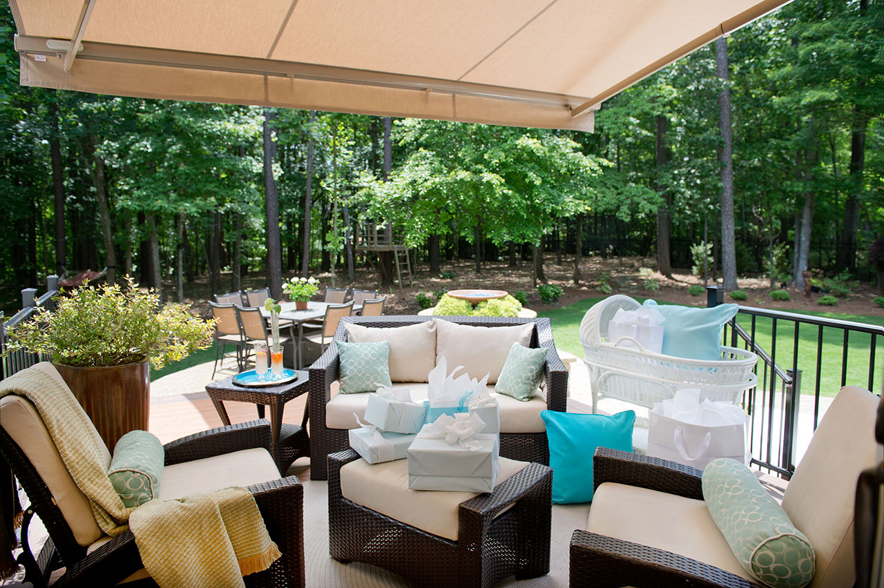 Wide backyard view of a Solair® retractable awning